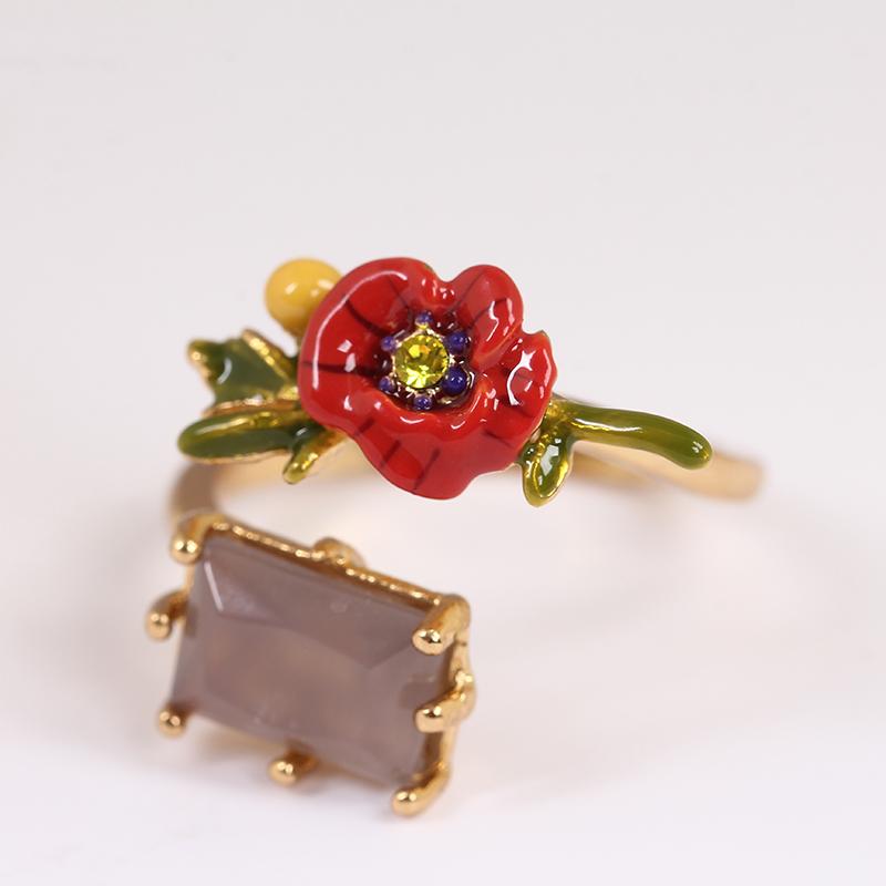 Adjustable Ring With Faceted Crystal and Red Flower