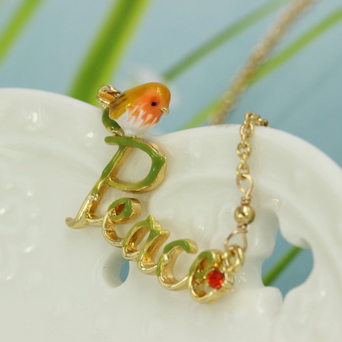 Bird On Peach And Crystal Enamel Necklace